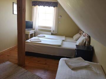 Фото номера Трехместный номер эконом-класса с общей ванной комнатой Отель Marcienas Muiza &amp; SPA г. Марциена 5